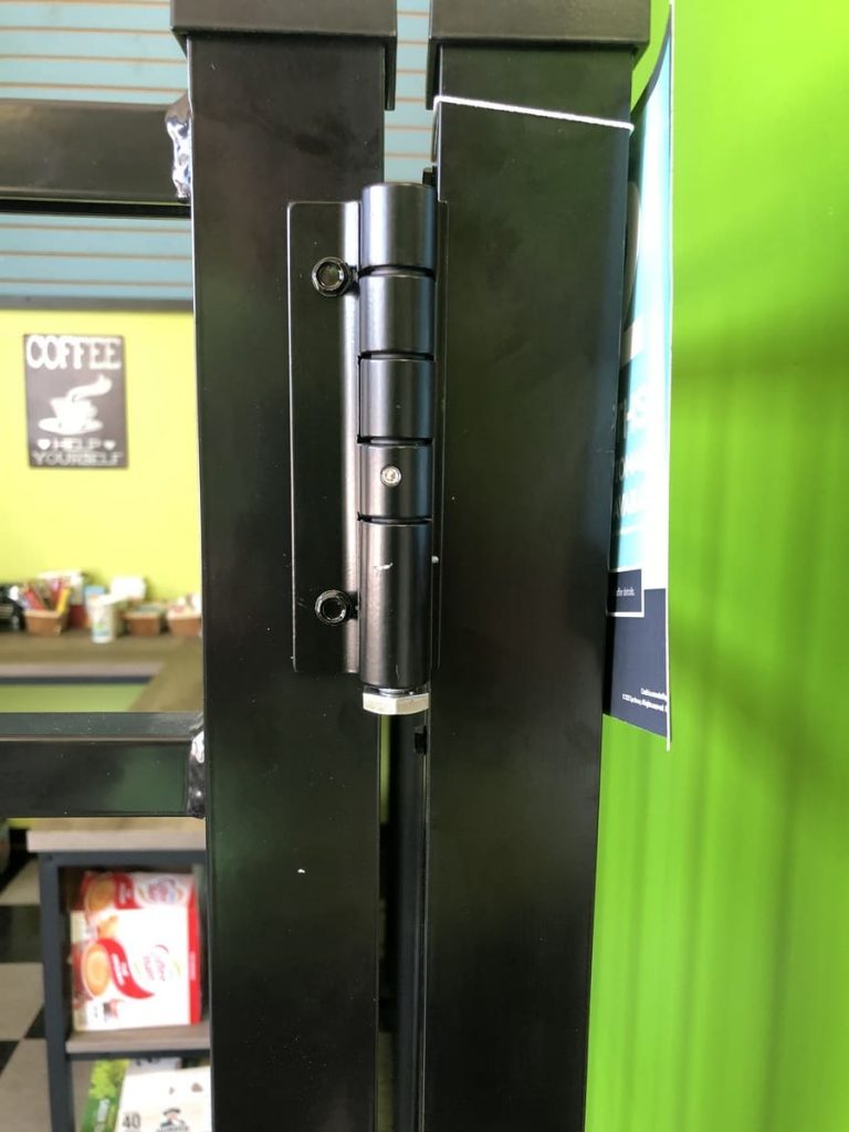 This is a self closing pool gate hinge that uses a wrench for adjustment.